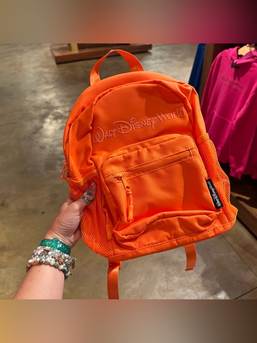 Disney orange backpack WDW 2026